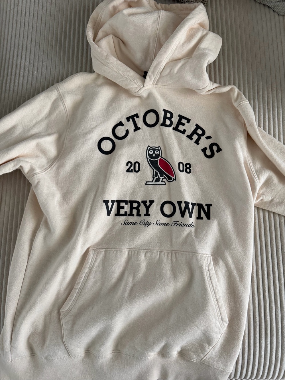 OVO Cream Hoodie with Black Owl Tag and Black Lettering